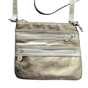 Cute Textured champagne Patten leather look crossbody bag.